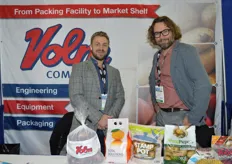 Nicholas Saphos with Volm Companies and Wim van der Meulen with Jasa Packaging Solutions show several bagging options. The bag on the left is from Volm's wicketed bagger while the other three bagging options are from the vertical form fill machine.
